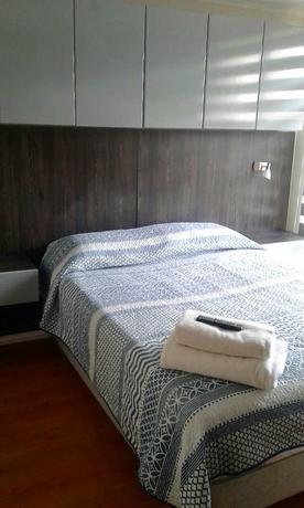 Imagen de la habitación del Hotel AM Departamentos. Foto 2