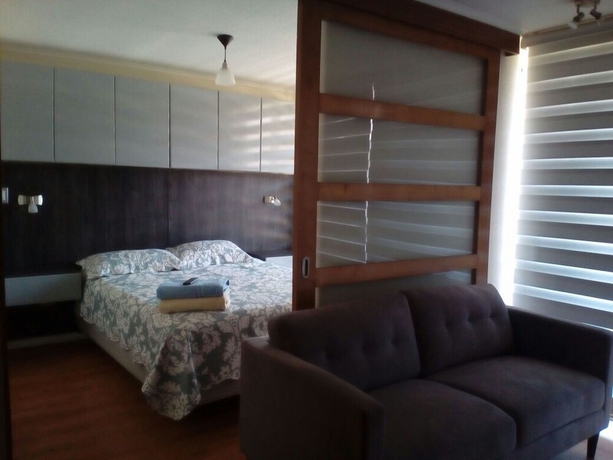 Imagen de la habitación del Hotel AM Departamentos. Foto 5