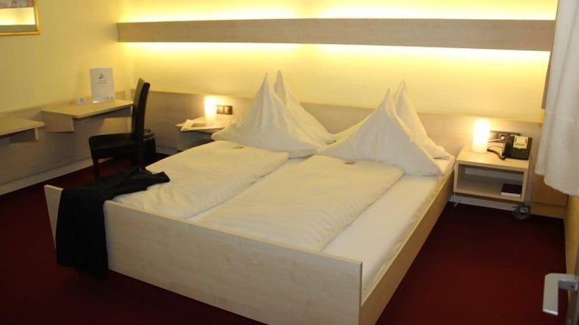 Imagen de la habitación del Hotel AM MARSCHIERTOR. Foto 7