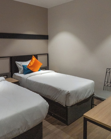 Imagen de la habitación del Hotel AM PM. Foto 1