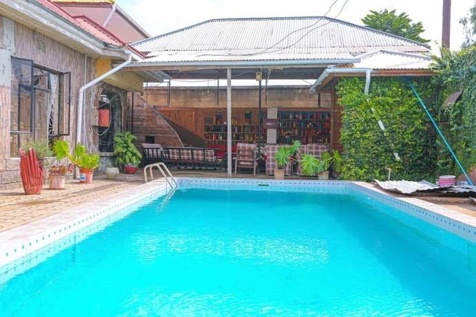 Imagen de la piscina del Hotel AMANI HOSTEL. Foto 9