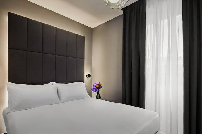 Imagen de la habitación del Hotel AMANO Covent Garden. Foto 6