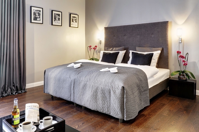 Imagen de la habitación del Hotel AMANO Düsseldorf. Foto 7