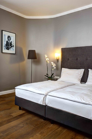 Imagen de la habitación del Hotel AMANO Düsseldorf. Foto 9