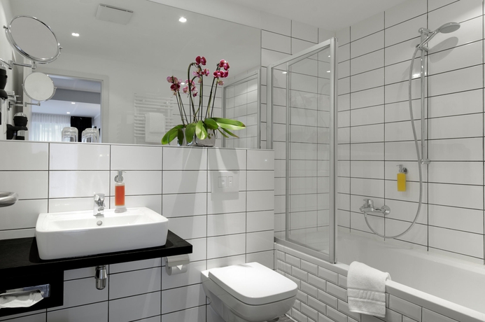Imagen de la habitación del Hotel AMANO Düsseldorf. Foto 10