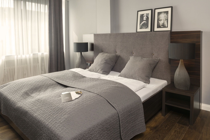 Imagen de la habitación del Hotel AMANO Düsseldorf. Foto 11