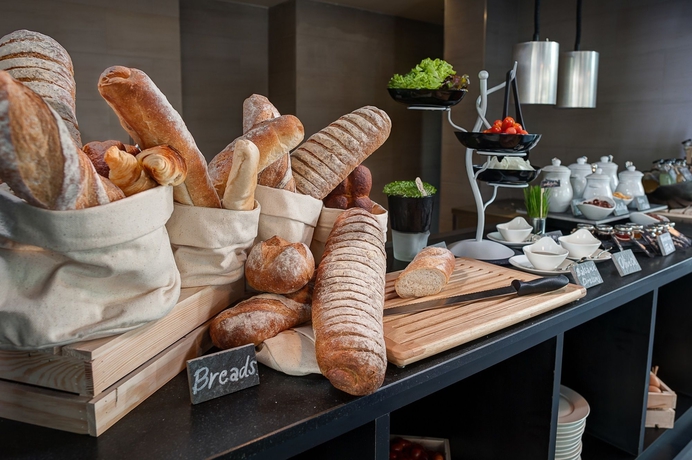 Imagen del bar/restaurante del Hotel AMANOR Hotel Chiang Mai. Foto 4