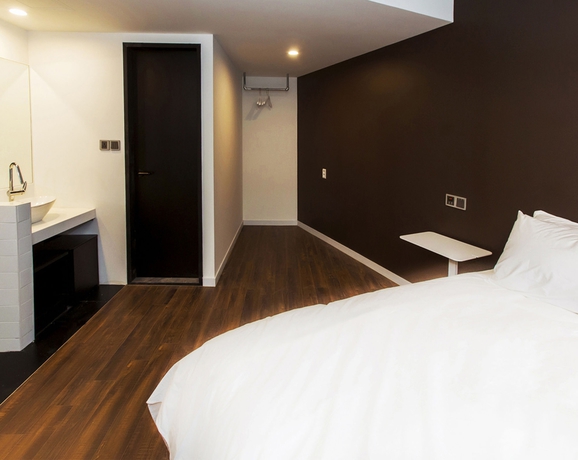 Imagen de la habitación del Hotel AMASS. Foto 7