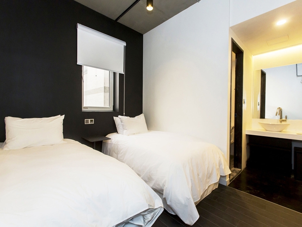 Imagen de la habitación del Hotel AMASS. Foto 10