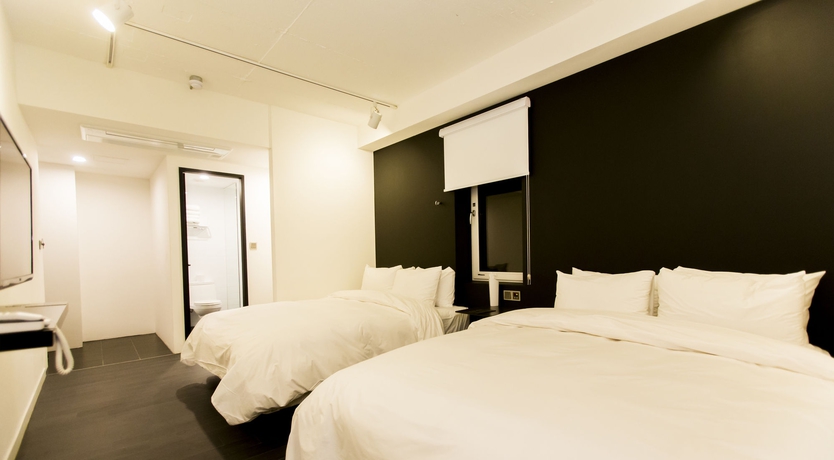 Imagen de la habitación del Hotel AMASS. Foto 12