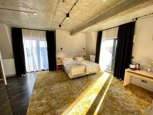 Imagen de la habitación del Hotel AMBER PORT. Foto 16