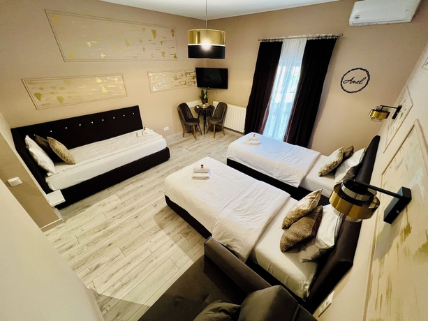 Imagen de la habitación del Hotel AMEL ROOMS. Foto 2