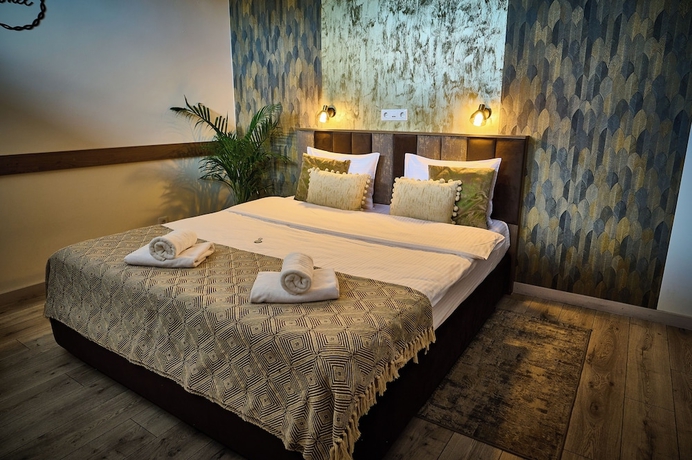 Imagen de la habitación del Hotel AMEL ROOMS. Foto 5