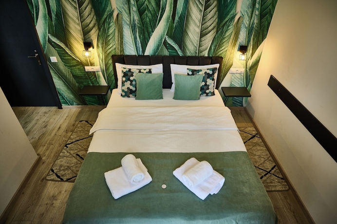 Imagen de la habitación del Hotel AMEL ROOMS. Foto 7