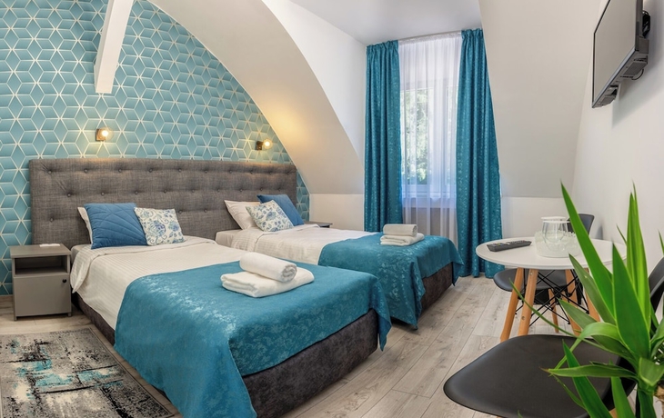 Imagen de la habitación del Hotel AMEL ROOMS. Foto 11