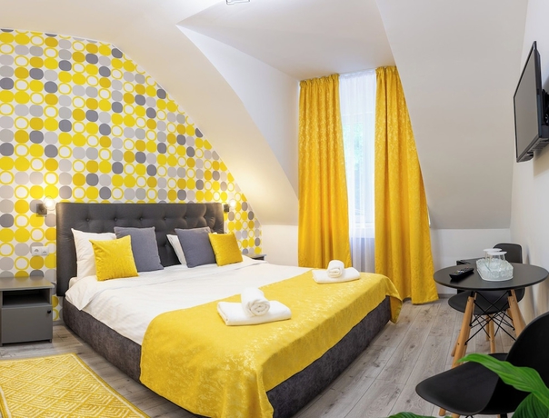 Imagen de la habitación del Hotel AMEL ROOMS. Foto 12