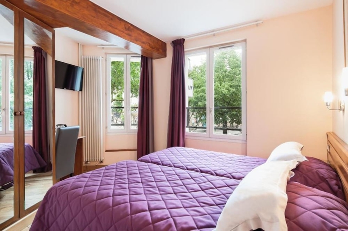 Imagen de la habitación del Hotel AMERICAIN. Foto 4