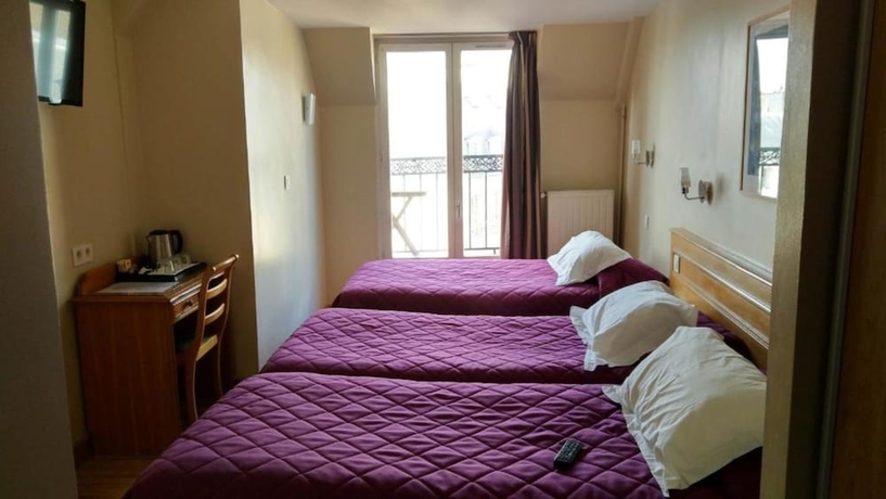 Imagen de la habitación del Hotel AMERICAIN. Foto 6