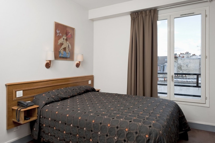 Imagen de la habitación del Hotel AMERICAIN. Foto 13