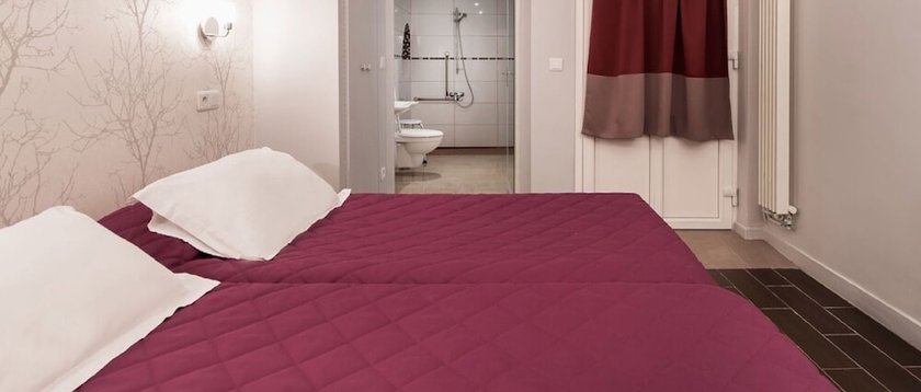 Imagen de la habitación del Hotel AMERICAIN HOTEL. Foto 5