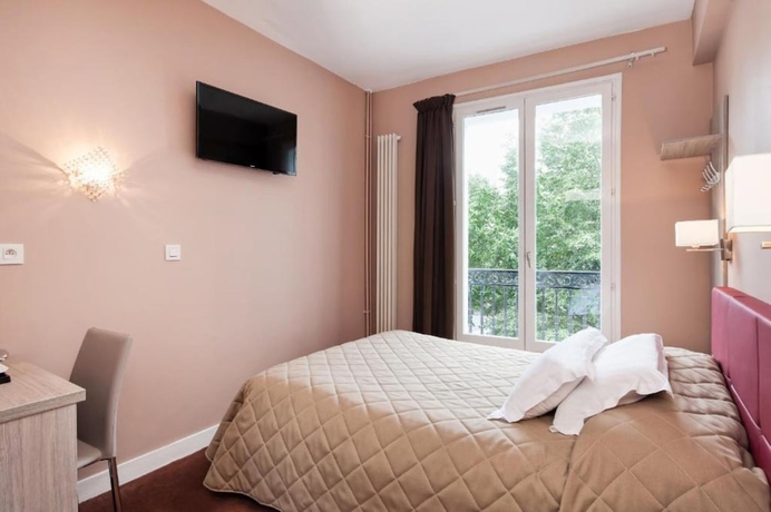 Imagen de la habitación del Hotel AMERICAIN HOTEL. Foto 8