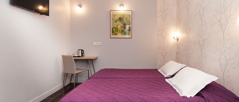 Imagen de la habitación del Hotel AMERICAIN HOTEL. Foto 12