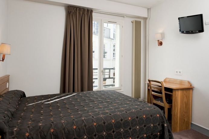 Imagen de la habitación del Hotel AMERICAIN HOTEL. Foto 14