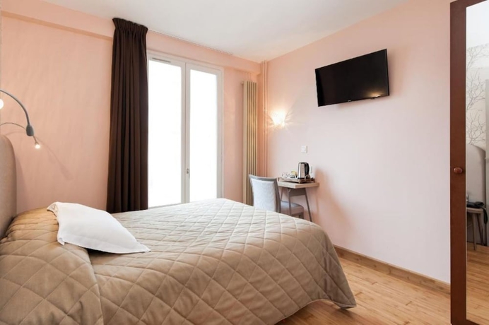 Imagen de la habitación del Hotel AMERICAIN HOTEL. Foto 16