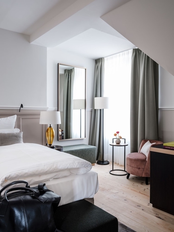 Imagen de la habitación del Hotel AMERON Neuschwanstein Alpsee Resort and Spa. Foto 11