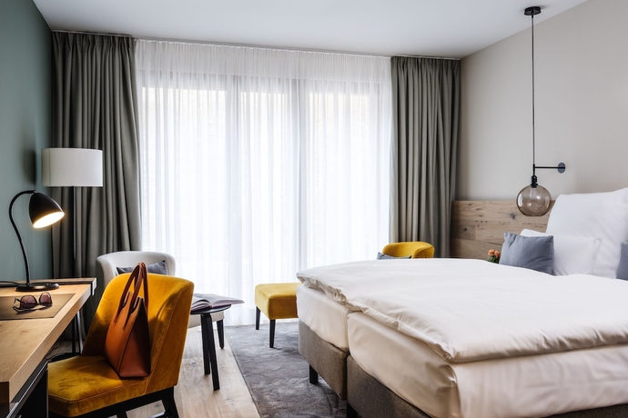 Imagen de la habitación del Hotel AMERON Neuschwanstein Alpsee Resort and Spa. Foto 12