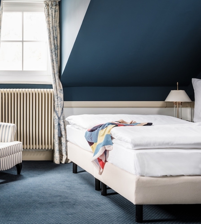 Imagen de la habitación del Hotel AMERON Neuschwanstein Alpsee Resort and Spa. Foto 16