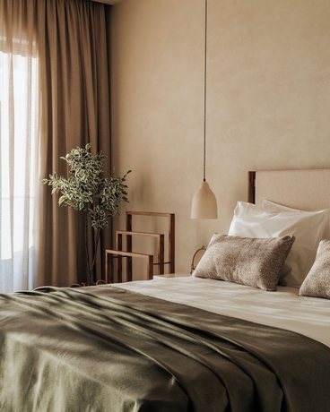 Imagen de la habitación del Hotel AM&Eacute;NTE Mindful Suites. Foto 10