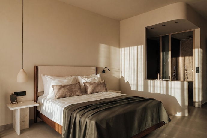 Imagen de la habitación del Hotel AM&Eacute;NTE Mindful Suites. Foto 12
