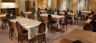 Imagen del bar/restaurante del Hotel AMÉRICA HOTEL. Foto 4