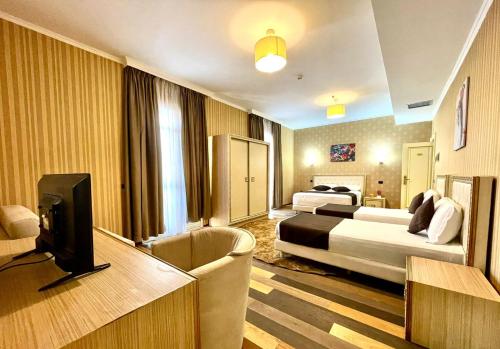 Imagen de la habitación del Hotel AMH Durres. Foto 13