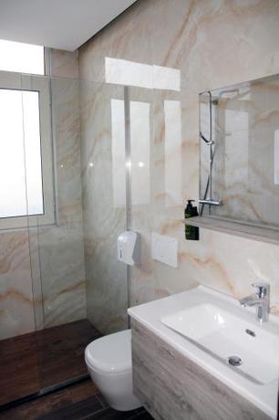 Imagen de la habitación del Hotel AMH Durres. Foto 14