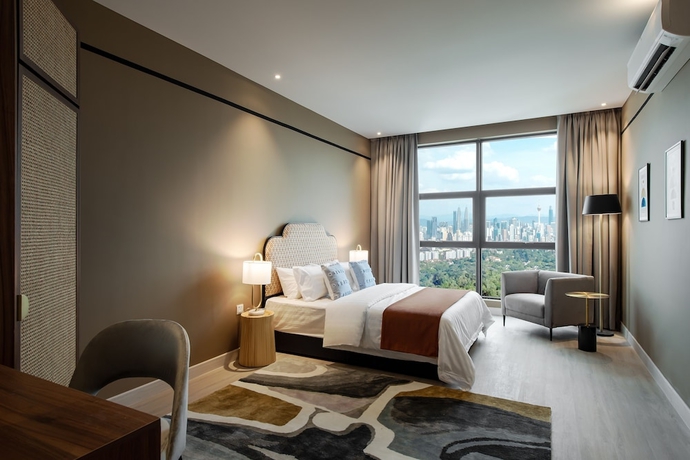 Imagen de la habitación del Hotel AMI Suites. Foto 7