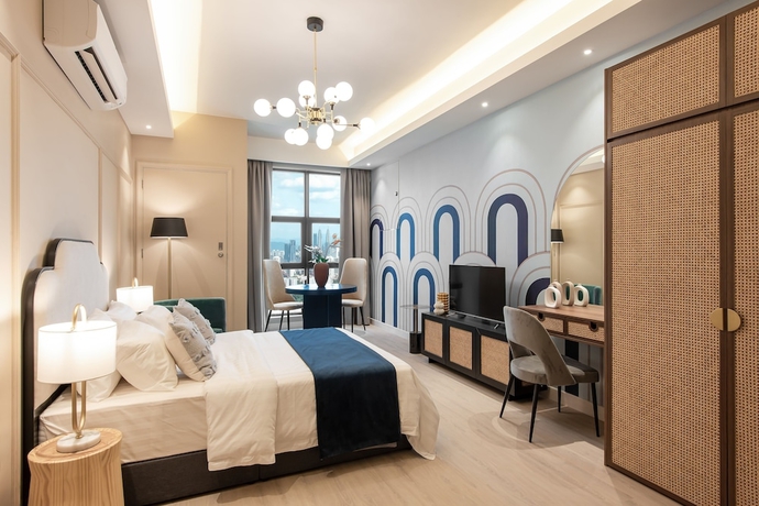 Imagen de la habitación del Hotel AMI Suites. Foto 8