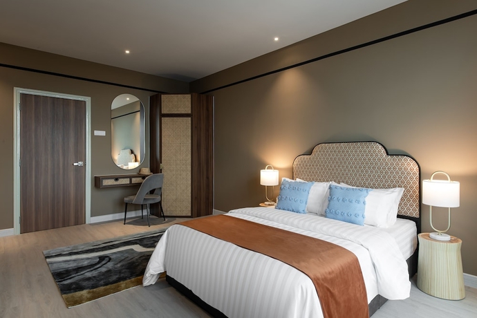 Imagen de la habitación del Hotel AMI Suites. Foto 10