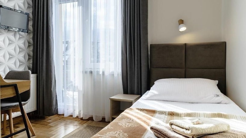 Imagen de la habitación del Hotel AMI ZAKOPANE. Foto 7
