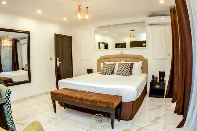 Imagen de la habitación del Hotel AMJ. Foto 18