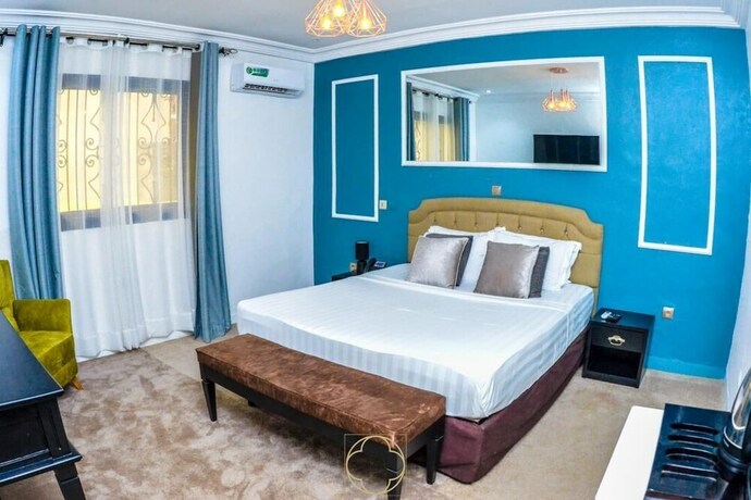 Imagen de la habitación del Hotel AMJ. Foto 19