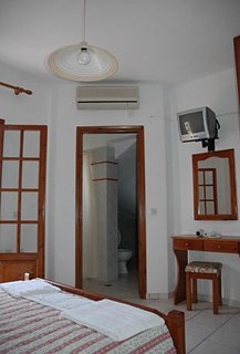 Imagen de la habitación del Hotel AMORE VILLAS. Foto 11
