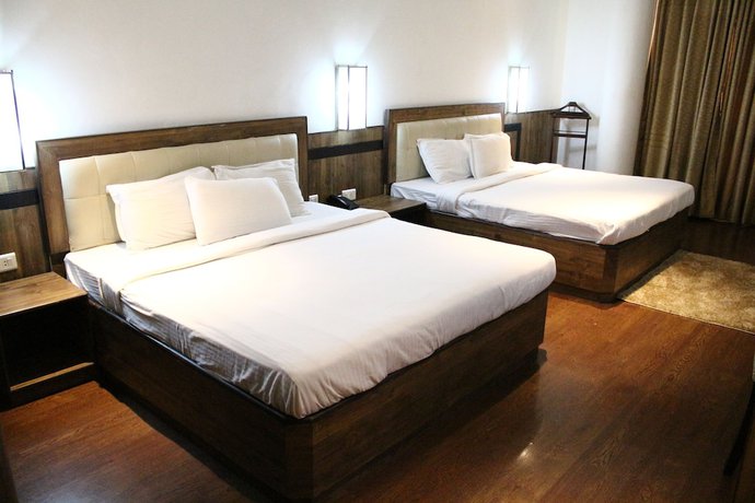 Imagen de la habitación del Hotel AMR, Katra. Foto 3