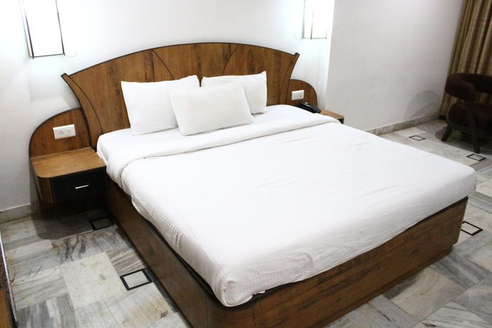 Imagen de la habitación del Hotel AMR, Katra. Foto 6
