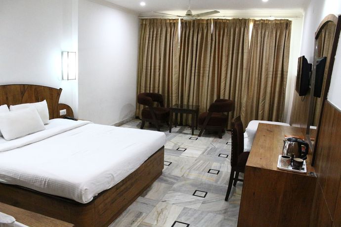 Imagen de la habitación del Hotel AMR, Katra. Foto 8