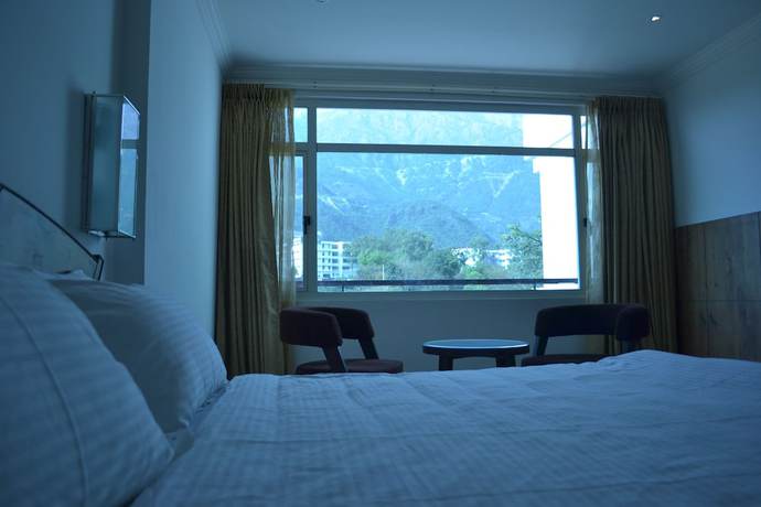 Imagen de la habitación del Hotel AMR, Katra. Foto 9