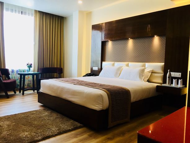 Imagen de la habitación del Hotel AMR, Katra. Foto 12