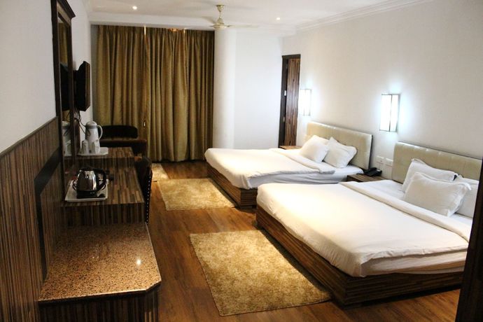Imagen de la habitación del Hotel AMR, Katra. Foto 15