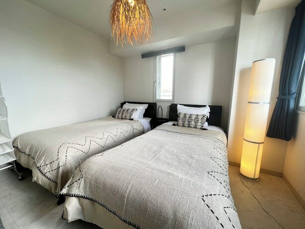 Imagen de la habitación del Hotel AMS Tower Nakajima. Foto 32
